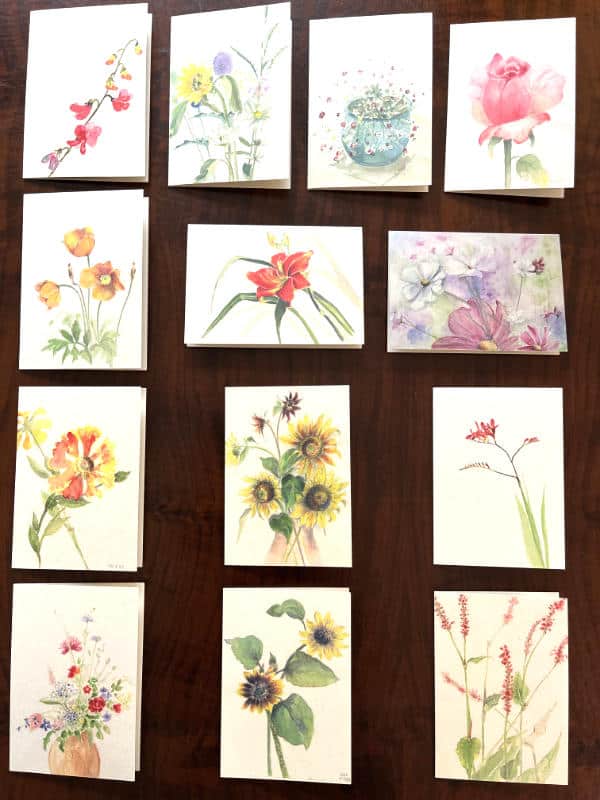 Het assortiment wenskaarten van zomerbloemen.